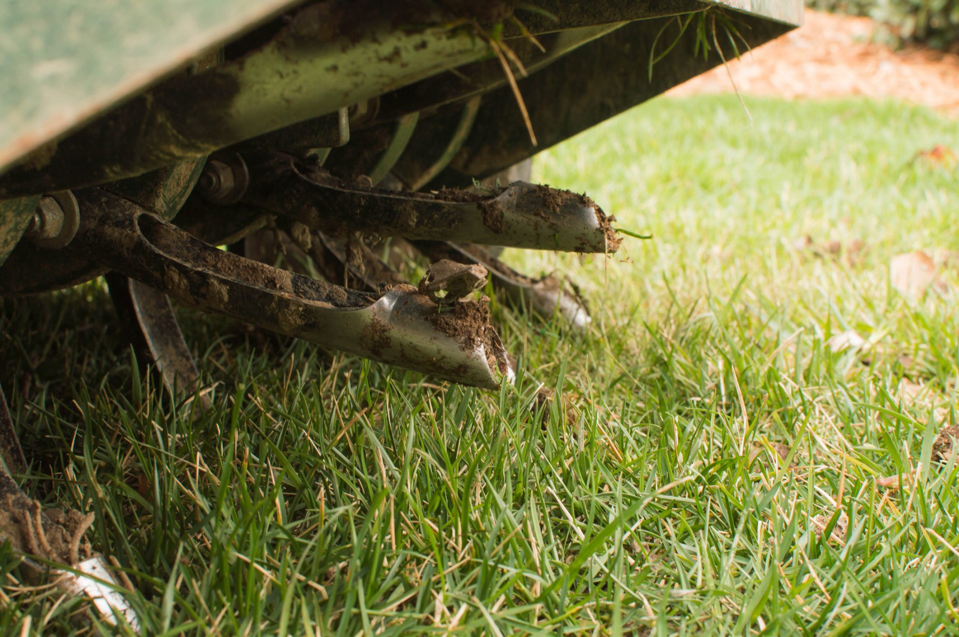 A mechanical core aeration tool in action.